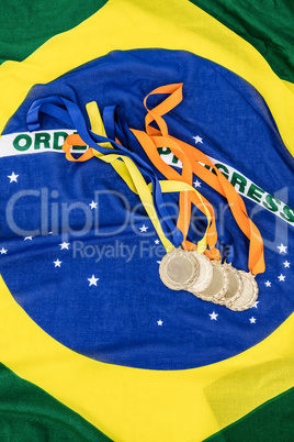 Gold medals on brazilian flag