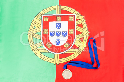 Gold medal on portuguese flag