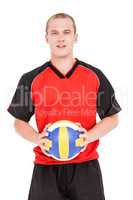 Sportsman holding a volleyball