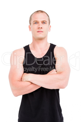 Athlete standing with arms crossed