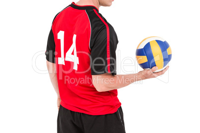 Sportsman holding a volleyball