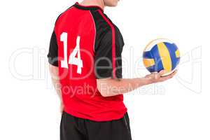 Sportsman holding a volleyball