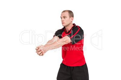 Sportsman posing while playing volleyball