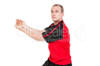 Sportsman posing while playing volleyball