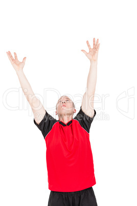 Sportsman posing while playing volleyball