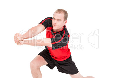 Sportsman posing while playing volleyball