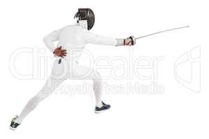 Man wearing fencing suit practicing with sword