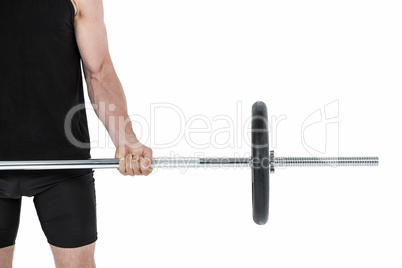 Bodybuilder lifting heavy barbell weights