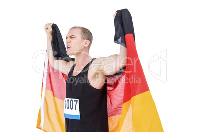 Athlete posing with german flag after victory