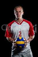 Sportsman holding a volleyball