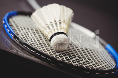 Close up of shuttlecock and badminton racket