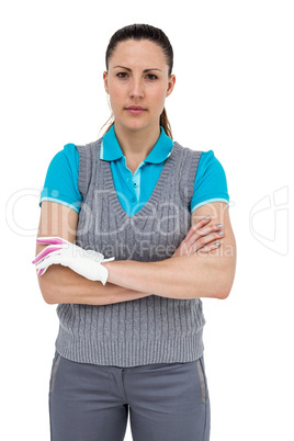 Golf player standing on white background