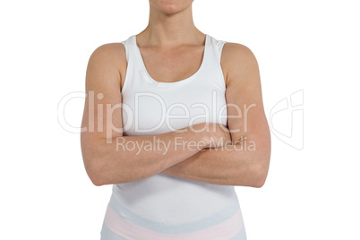Female athlete standing on white background
