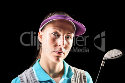 Golf player on black background