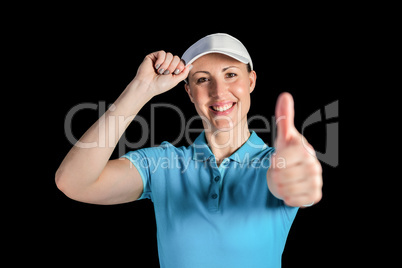 Sportswoman posing on black background