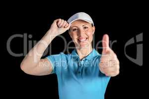 Sportswoman posing on black background