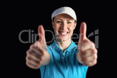 Sportswoman posing on black background