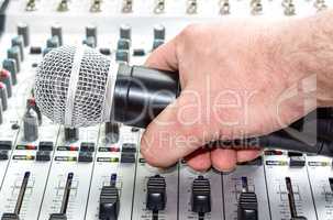 Hand with microphone