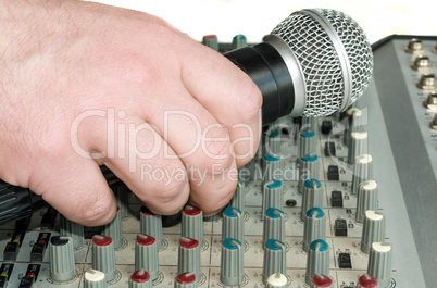 Hand with microphone