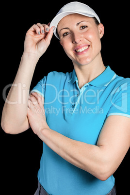 Sportswoman posing on black background