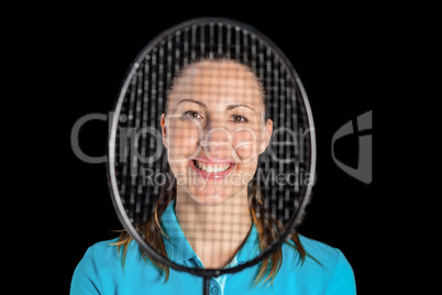 Female athlete posing with badminton racket