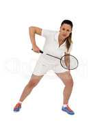 Female player playing badminton