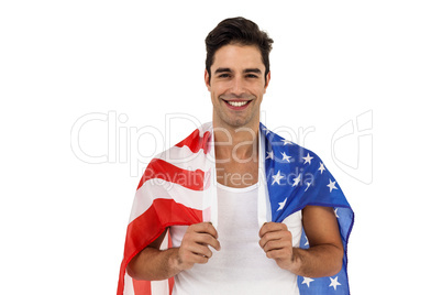 Athlete with american flag wrapped around his body