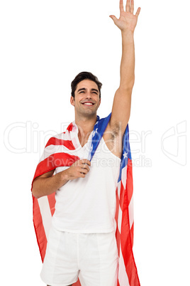 Athlete with american flag wrapped around his body