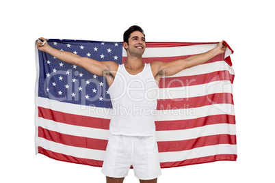 Athlete posing with american flag after victory