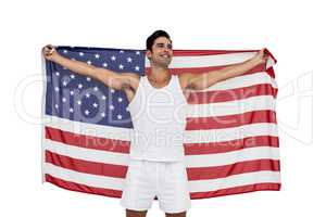 Athlete posing with american flag after victory