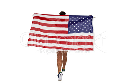 Athlete posing with american flag after victory