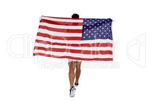 Athlete posing with american flag after victory