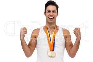 Athlete posing with gold medal after victory