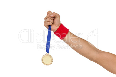 Athlete holding gold medal after victory