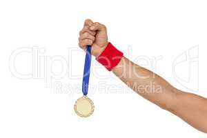 Athlete holding gold medal after victory