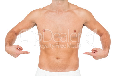 Male athlete posing on white background