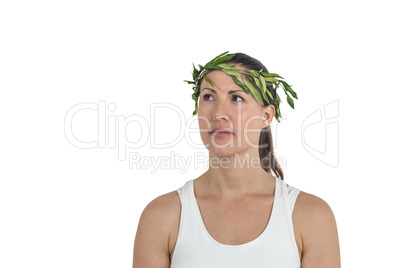 Female athlete wearing green roman laurel wreath