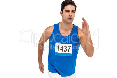 Male athlete running on white background