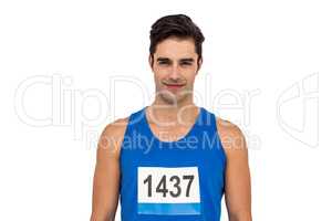 Male athlete standing on white background