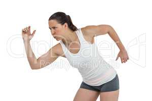 Female athlete running on white background