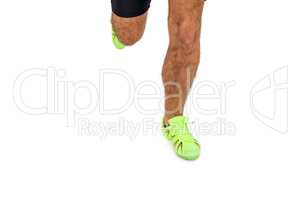 Athlete feet running on white background