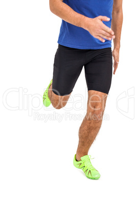 Male athlete running on white background