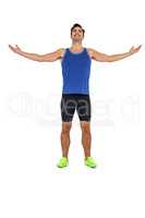 Athlete man standing with arms outstretched