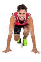 Portrait of athlete man in ready to run position