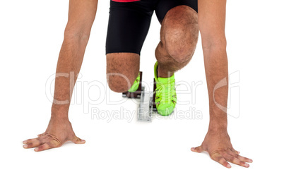 Athlete man in ready to run position