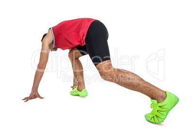 Male athlete in ready to run position