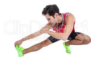 Male athlete stretching his hamstring