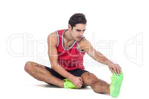Male athlete stretching his hamstring