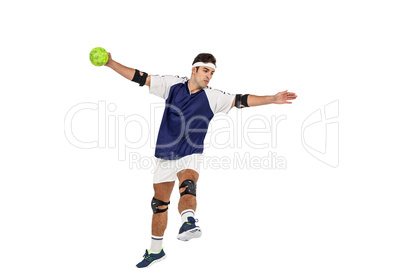 Sportsman posing with ball on white background