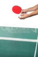 Male athlete playing table tennis